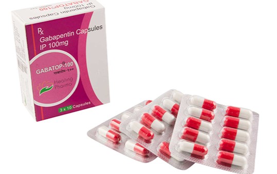 Gabapentin 100mg capsule or tablet, a white or yellowish-white pill used to treat epilepsy, nerve pain, and restless legs syndrome